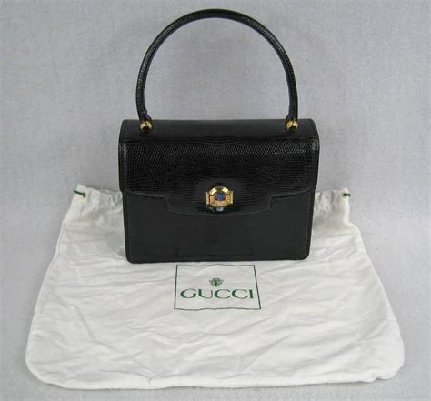 vintage gucci dreasuit|older black gucci purses.